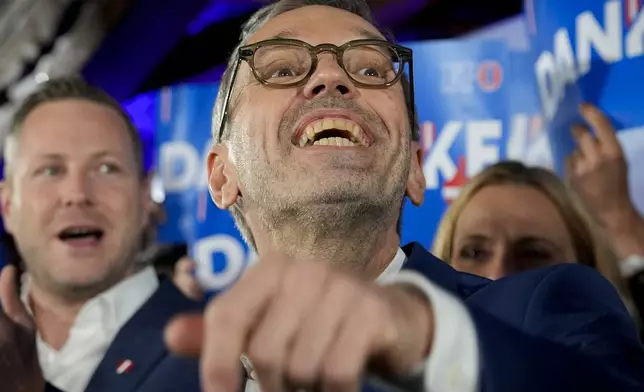 Herbert Kickl, leader of the Freedom Party of Austria waves to supporters, in Vienna, Austria, Sunday, Sept. 29, 2024, after polls closed in the country's national election. (AP Photo/Andreea Alexandru)