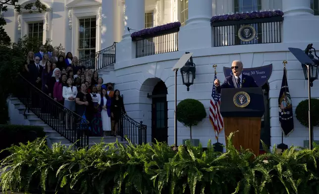 President Joe Biden speaks during the Violence Against Women Act 30th anniversary celebration on the South Lawn of the White House, Thursday, Sept. 12, 2024, in Washington. (AP Photo/Manuel Balce Ceneta)