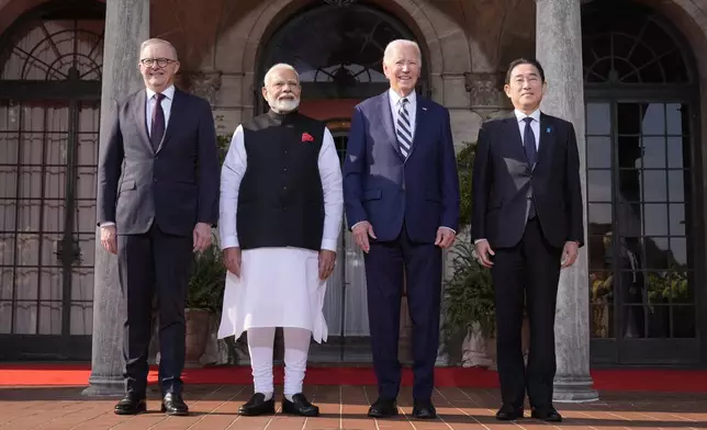 President Joe Biden greets from left, Australia's Prime Minister Anthony Albanese, India's Prime Minister Narendra Modi, Biden, and Japan's Prime Minister Fumio Kishida, at the Quad leaders summit at Archmere Academy in Claymont, Del., Saturday, Sept. 21, 2024. (AP Photo/Mark Schiefelbein)