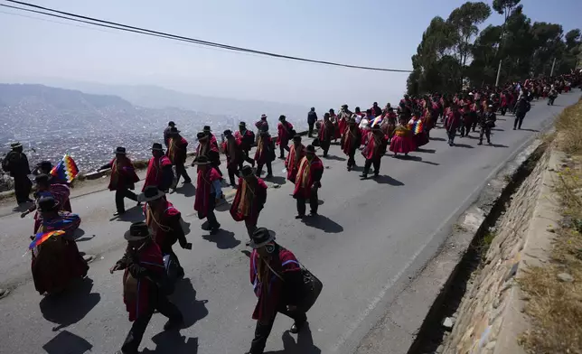 Farmers march to protest the government of President Luis Arce, in El Alto, Bolivia, Wednesday, Sept. 25, 2024. (AP Photo/Juan Karita)