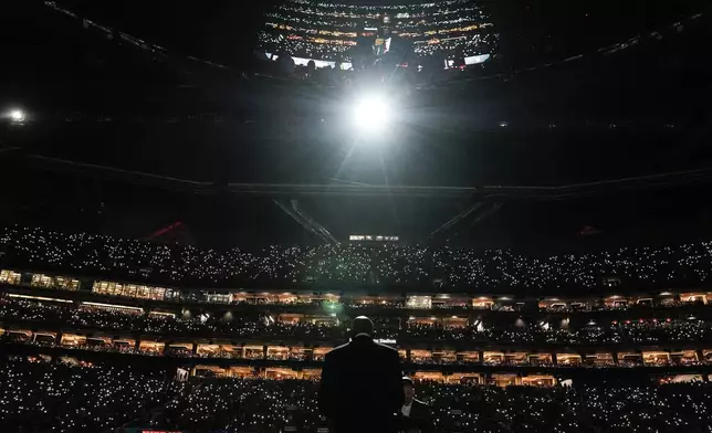 Actor Samuel L. Jackson speaks during an Atlanta Falcons Ring of Honor induction ceremony for Atlanta Falcons owner Arthur Blank at halftime of an NFL football game between the Atlanta Falcons and the Kansas City Chiefs, Sunday, Sept. 22, 2024, in Atlanta. (AP Photo/Brynn Anderson)