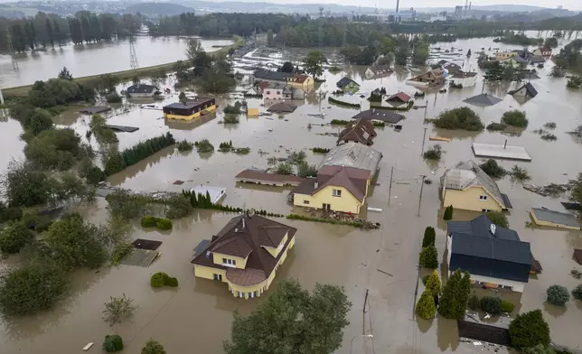 An aerial view of a flooded neighbourhood in Ostrava, Czech Republic, Monday, Sept. 16, 2024. (AP Photo/Darko Bandic)