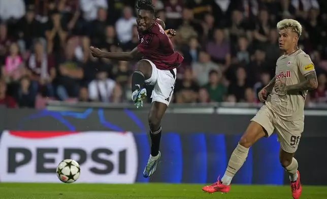 Sparta's Victor Olatunji scores his side's second goal during the Champions League opening phase soccer match between Sparta Prague and Salzburg in Prague, Czech Republic, Wednesday, Sept. 18, 2024. (AP Photo/Petr David Josek)