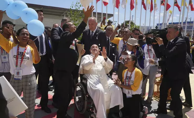 Pope Francis attends the meeting with young people in Centro de Convencoes in Dili, East Timor, Wednesday, Sept. 11, 2024. (AP Photo/Firdia Lisnawati)