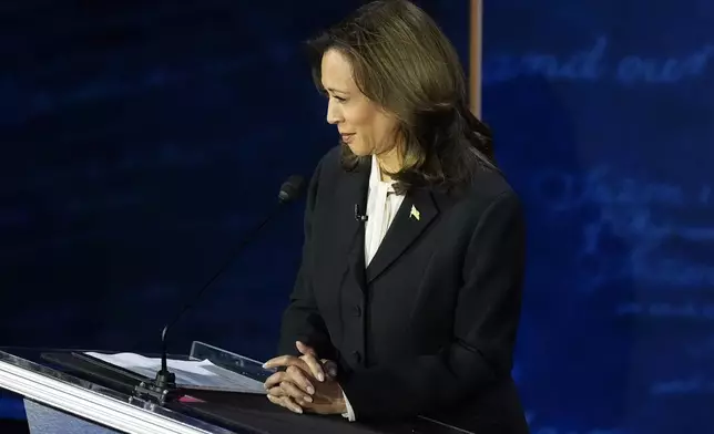 Democratic presidential nominee Vice President Kamala Harris listens during a presidential debate with Republican presidential nominee former President Donald Trump at the National Constitution Center, Tuesday, Sept.10, 2024, in Philadelphia. (AP Photo/Alex Brandon)