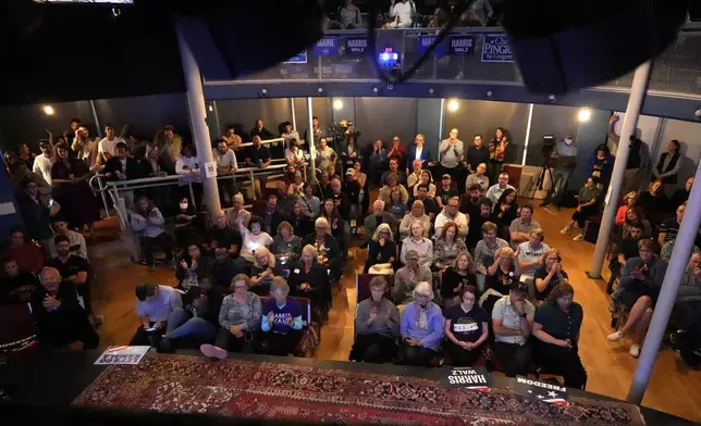 A full house packs One Longfellow Square to watch the presidential debate between Republican presidential nominee former President Donald Trump and Democratic presidential nominee Vice President Kamala Harris, Tuesday, Sept. 10, 2024, in Portland, Maine. (AP Photo/Robert F. Bukaty)