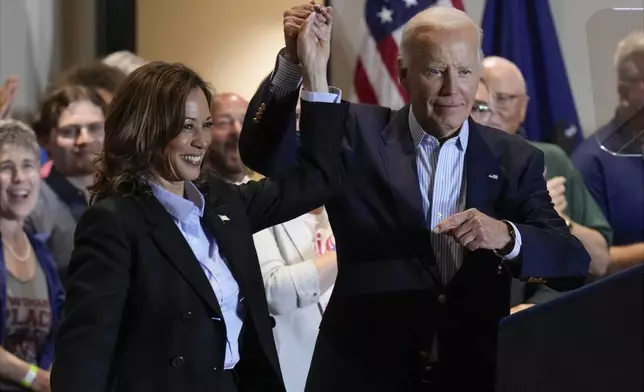 Democratic presidential nominee Vice President Kamala Harris and President Joe Biden arrive at a campaign event at the IBEW Local Union #5 union hall in Pittsburgh, on Labor Day, Monday, Sept. 2, 2024. (AP Photo/Jacquelyn Martin)