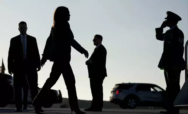 Democratic presidential nominee Vice President Kamala Harris gets ready to board Air Force Two, Sunday, Sept. 29, 2024, in Los Angeles. (AP Photo/Mark J. Terrill)