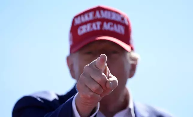 Republican presidential nominee former President Donald Trump gestures during a campaign event at Central Wisconsin Airport, Saturday, Sept. 7, 2024, in Mosinee, Wis. (AP Photo/Alex Brandon)