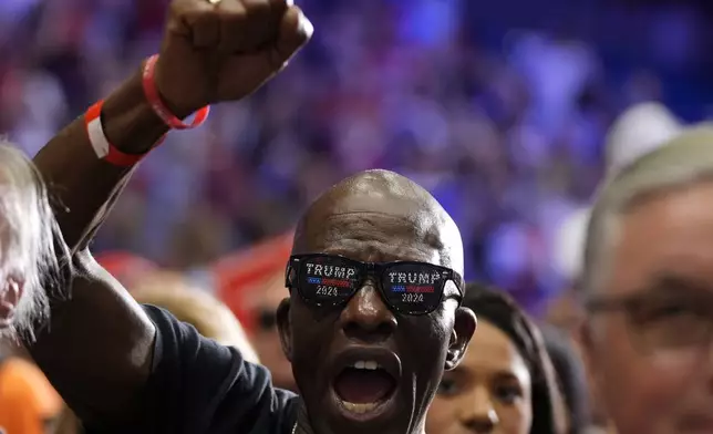 A supporter chants "USA" before Republican presidential nominee former President Donald Trump speaks during a campaign event, Friday, Aug. 30, 2024, in Johnstown, Pa. (AP Photo/Alex Brandon)