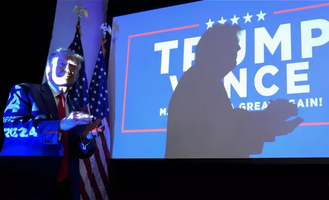 Republican presidential nominee former President Donald Trump arrives to speak to the National Fraternal Order of Police fall meeting, Friday, Sept. 6, 2024, in Charlotte, N.C. (AP Photo/Evan Vucci)