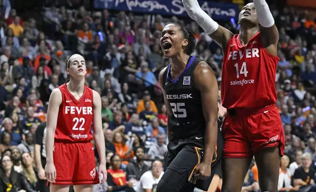 Connecticut Sun forward Alyssa Thomas (25) celebrates a basket while being fouled during the second half in Game 2 of a first-round WNBA basketball playoff series against the Indiana Fever, Wednesday, Sept. 25, 2024, in Uncasville, Conn. (AP Photo/Jessica Hill)