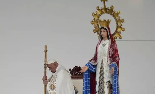 Pope Francis leads the holy mass at Gelora Bung Karno Stadium in Jakarta, Indonesia, Thursday, Sept. 5, 2024. (AP Photo/Achmad Ibrahim, Pool)