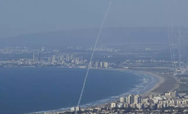 Israeli Iron Dome air defense system fires to intercept rockets that were launched from Lebanon, in northern Israel, Monday, Sept. 23, 2024. (AP Photo/Baz Ratner)