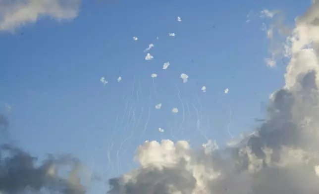 Israeli Iron Dome air defense system fires to intercept rockets that were launched from Lebanon, in northern Israel, Sunday, Sept. 22, 2024. (AP Photo/Baz Ratner)