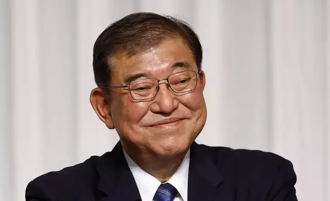 Shigeru Ishiba, the newly elected leader of Japan's ruling party, the Liberal Democratic Party (LDP) holds a press conference after the LDP leadership election, in Tokyo Friday, Sept. 27, 2024. (Kim Kyung-Hoon/Pool Photo via AP)