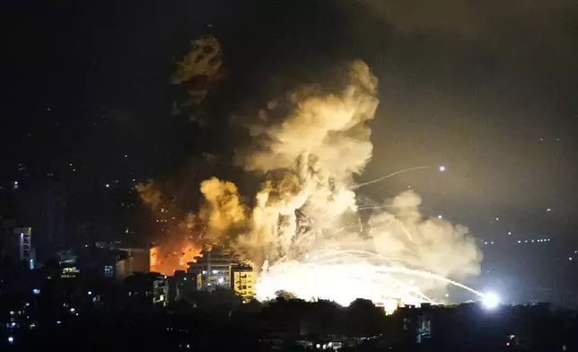 Smoke rises from Israeli airstrikes in Beirut's southern suburbs, Lebanon, Saturday, Sept. 28, 2024. (AP Photo/Hassan Ammar)