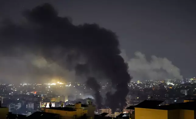 Smoke rises from Israeli airstrikes in Beirut's southern suburbs, Lebanon, Saturday, Sept. 28, 2024. (AP Photo/Hassan Ammar)