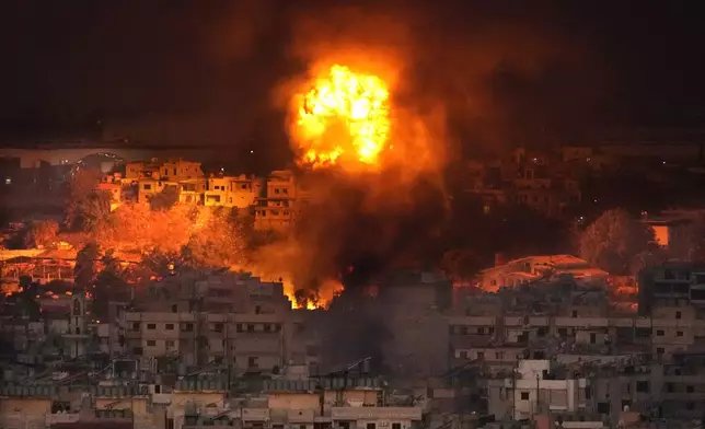 Flames rise after an Israeli airstrike in the southern suburbs of Beirut, Lebanon, Saturday, Sept. 28, 2024. (AP Photo/Hussein Malla)