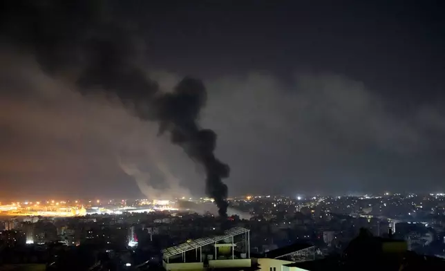 Smoke rises from Israeli airstrikes in Beirut's southern suburbs, Lebanon, Saturday, Sept. 28, 2024. (AP Photo/Hassan Ammar)