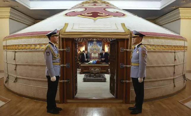 Russian President Vladimir Putin, center left, and Mongolian President Ukhnaagiin Khurelsukh attend their meeting at the Saaral Ordon Government Building in Ulaanbaatar, Mongolia, Tuesday, Sept. 3, 2024. (Vyacheslav Prokofyev, Sputnik, Kremlin Pool Photo via AP)