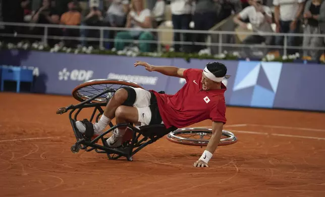 Japan's Tokito Oda celebrates after winning the men's singles gold medal match of wheelchair tennis at the 2024 Paralympics, Saturday, Sept. 7, 2024, in Paris, France. (AP Photo/Thibault Camus)