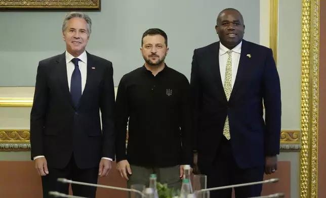 U.S. Secretary of State Antony Blinken and Britain's Foreign Secretary David Lammy meet with Ukraine's President Volodymyr Zelenskyy at the Mariinsky Palace in Kyiv, Ukraine, Wednesday, Sept. 11, 2024. (AP Photo/Mark Schiefelbein, Pool)