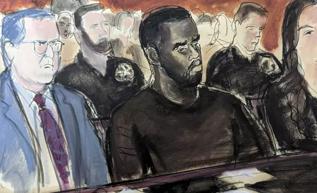 In this courtroom sketch, Sean Combs, center, is flanked by his defense attorney Marc Agnifilo, left, and Teny Garagos, in Manhattan Federal Court, Tuesday, Sept. 17, 2024, in New York. (Elizabeth Williams via AP)