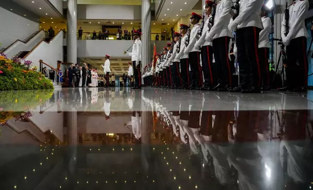 The President of the Singapore Republic Tharman Shanmugaratnam with Minister of Culture, Community and Youth Edwin Tong, the Ambassador of Singapore to the Holy See Ang Janet Guat Har and other authorities wait for Pope Francis at the Parliament House in Singapore, Thursday, Sept. 12, 2024. Pope Francis flew to Singapore on Wednesday for the final leg of his trip through Asia, arriving in one of the world's richest countries from one of its poorest after a record-setting final Mass in East Timor. (AP Photo/Gregorio Borgia)