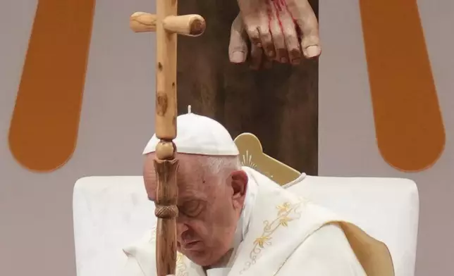 Pope Francis leads a holy mass at the SportsHub National Stadium in Singapore, Thursday, Sept. 12, 2024. (AP Photo/Vincent Thian)