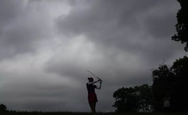 United States' Nelly Korda watches her shot on the first hole during a Solheim Cup golf tournament fourball match at Robert Trent Jones Golf Club, Friday, Sept. 13, 2024, in Gainesville, Va. (AP Photo/Matt York)