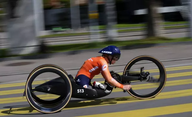 Chantal Haenen of the Netherlands competes in the para-cycling individual time-trial of the Cycling Road World Championships in Zurich, Switzerland, Tuesday, Sept. 24, 2024. (AP Photo/Peter Dejong)