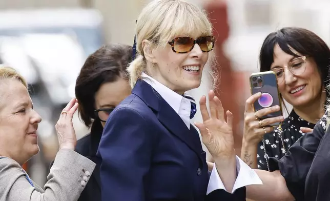 E. Jean Carroll exits the New York Federal Court after former President Donald Trump appeared in court, Friday, Sept. 6, 2024, in New York. (AP Photo/Eduardo Munoz Alvarez)