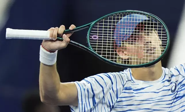 Alex de Minaur, of Australia, reacts after defeating Jordan Thompson, of Australia, during a fourth round match of the U.S. Open tennis championships, Monday, Sept. 2, 2024, in New York. (AP Photo/Eduardo Munoz Alvarez)