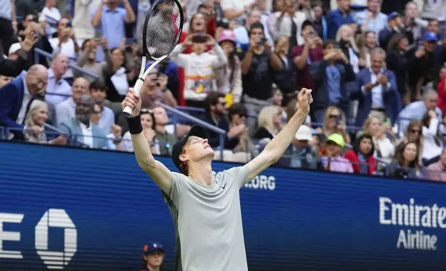 Jannik Sinner, of Italy, reacts after defeating Taylor Fritz, of the United States, to win the men's singles final of the U.S. Open tennis championships, Sunday, Sept. 8, 2024, in New York. (AP Photo/Kirsty Wigglesworth)