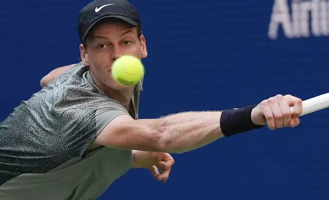 Jannik Sinner, of Italy, returns a shot to Christopher O'Connell, of Australia, during the third round of the U.S. Open tennis championships, Saturday, Aug. 31, 2024, in New York. (AP Photo/Julia Nikhinson)