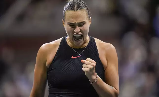 Aryna Sabalenka, of Belarus, reacts after scoring a point against Emma Navarro, of the United States, during the women's singles semifinals of the U.S. Open tennis championships, Thursday, Sept. 5, 2024, in New York. (AP Photo/Julia Nikhinson)