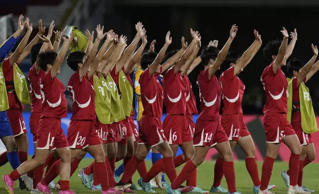 Players of North Korea walk off the field after defeating the United States in a U-20 Women's World Cup semifinal soccer match in Cali, Colombia, Wednesday, Sept. 18, 2024. (AP Photo/Fernando Vergara)