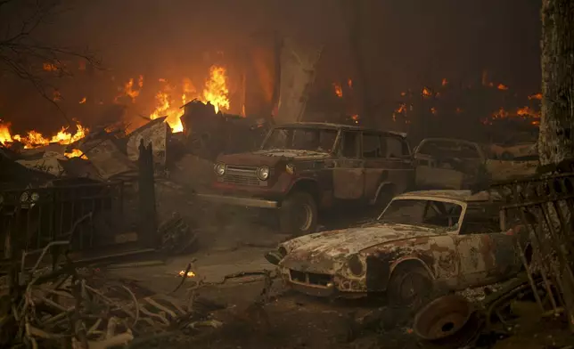 Vehicles sit destroyed after the Airport Fire swept through Tuesday, Sept. 10, 2024, in El Cariso, an unincorporated community in Riverside County, Calif. (AP Photo/Eric Thayer)