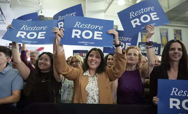 FILE - People listen as President Joe Biden speaks about reproductive freedom on April 23, 2024, at Hillsborough Community College in Tampa, Fla. (AP Photo/Manuel Balce Ceneta, file)