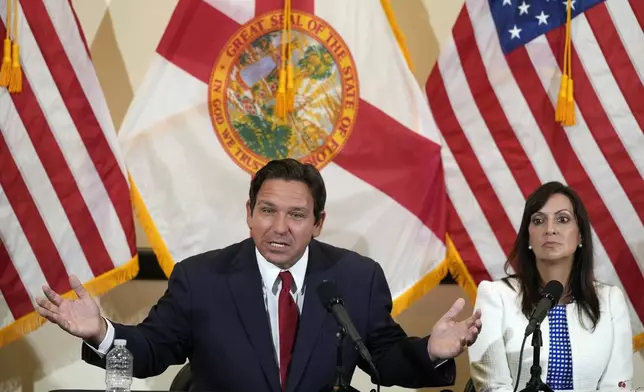 Florida Gov. Ron DeSantis gestures as he answers questions along with Lt. Gov. Jeanette Nuñez, after a roundtable discussion at the Roberto Alonso Community Center, Monday, Sept. 9, 2024, in Miami Lakes, Fla. (AP Photo/Wilfredo Lee)