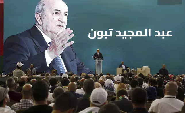 Algerian president and candidate for re-election Abdelmajid Tebboune delivers a speech during his campaign for the upcoming presidential election, in Oran, Algeria, Sunday, Aug. 26, 2024. (AP Photo/Str)