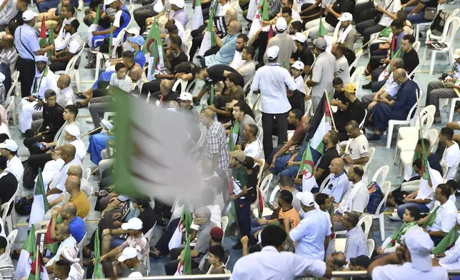 Supporters of presidential candidate of the Movement of Society for Peace (MSP), Hassani Cherif Abdelaâli, attend a rally on the last day of campaigning ahead of the presidential elections, in Algiers, Algeria, Tuesday, Sept. 3, 2024. (AP Photo/Fateh Guidoum)