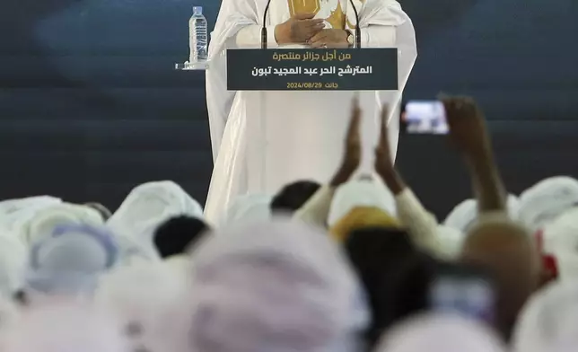 Algerian president and candidate for re-election Abdelmajid Tebboune delivers a speech as part of his campaign for the upcoming presidential election, in Djanet, Algeria, Thursday, Aug. 29, 2024. (AP Photo)