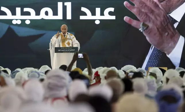 Algerian president and candidate for re-election Abdelmajid Tebboune delivers a speech as part of his campaign for the upcoming presidential election, in Djanet, Algeria, Thursday, Aug. 29, 2024. (AP Photo)