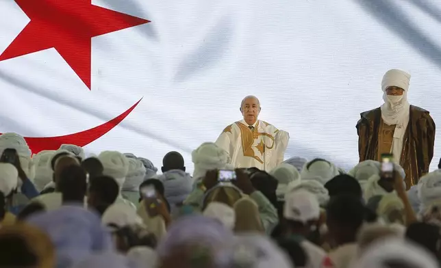 Algerian president and candidate for re-election Abdelmajid Tebboune delivers a speech as part of his campaign for the upcoming presidential election, in Djanet, Algeria, Thursday, Aug. 29, 2024. (AP Photo)