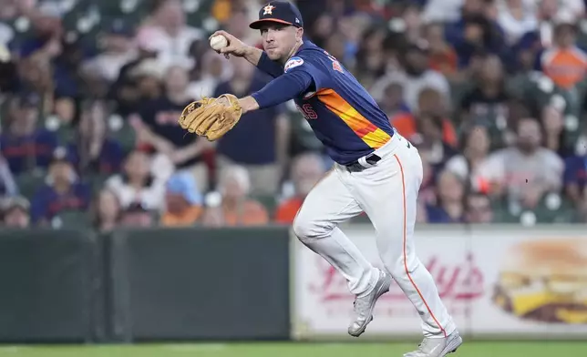 Houston Astros third baseman Alex Bregman throws out Los Angeles Angels' Gustavo Campero on a ground ball during the fifth inning of a baseball game Sunday, Sept. 22, 2024, in Houston. (AP Photo/Kevin M. Cox)