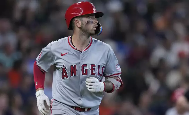 Los Angeles Angels' Zach Neto runs the bases after hitting a two-run home run during the sixth inning of a baseball game against the Houston Astros, Sunday, Sept. 22, 2024, in Houston. (AP Photo/Kevin M. Cox)