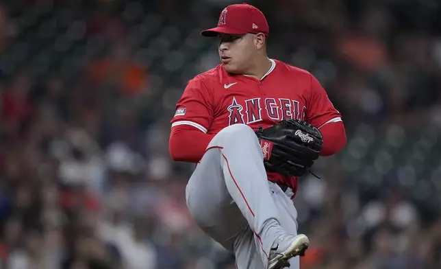 Los Angeles Angels starting pitcher José Suarez delivers during the first inning of a baseball game against the Houston Astros, Thursday, Sept. 19, 2024, in Houston. (AP Photo/Kevin M. Cox)