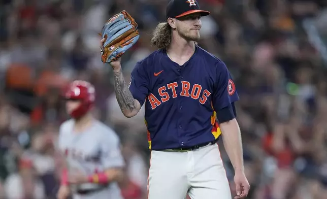 Houston Astros closer Josh Hader reacts after walking in the tying run during the ninth inning of a baseball game against the Los Angeles Angels, Sunday, Sept. 22, 2024, in Houston. (AP Photo/Kevin M. Cox)